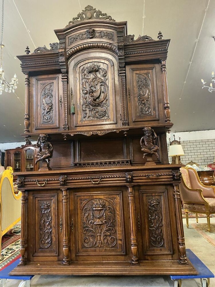 Opulent French Renaissance Walnut Cabinet with Whimsical Woodcut Clown Decor